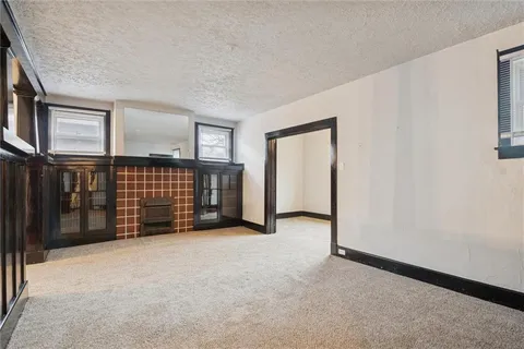 an empty room with windows