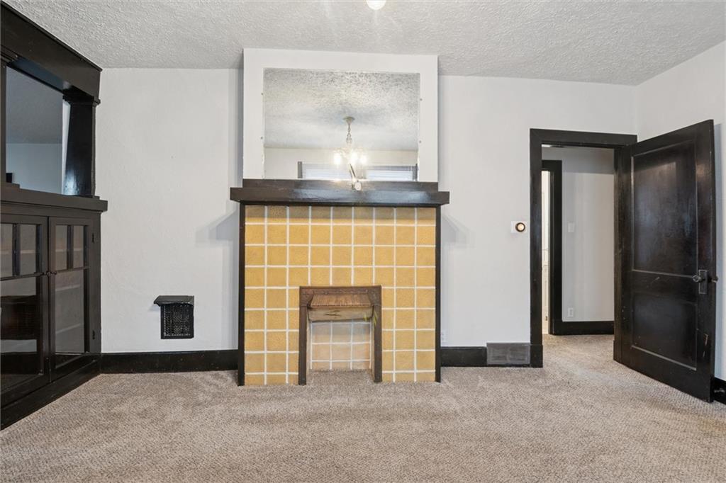 3518 Beechwood Boulevard Pittsburgh, PA 15217 - Photo 10 of 34 an empty room with fireplace