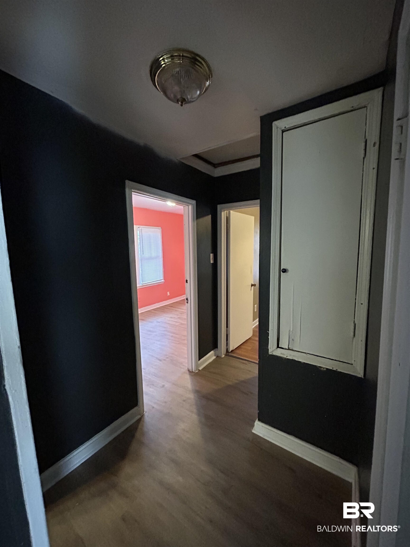 2119 Hoppin Street Mobile, AL 36605 - Photo 22 of 23 Hallway with hardwood / wood-style floors