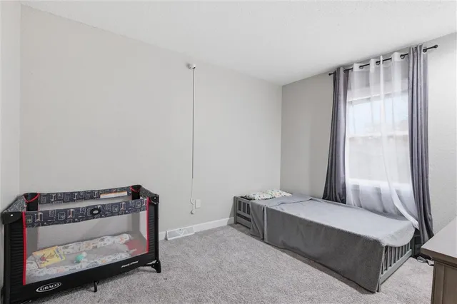 $305,000 | 302 Southeast Flagstone Street, Lee's Summit, MO 64063