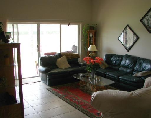 8388 Via Leonessa Boca Raton, FL 33433 - Photo 17 of 38 Living Room overlooking Lake