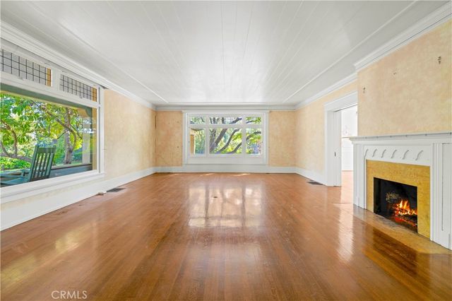 a kitchen with a sink a stove and refrigerator
