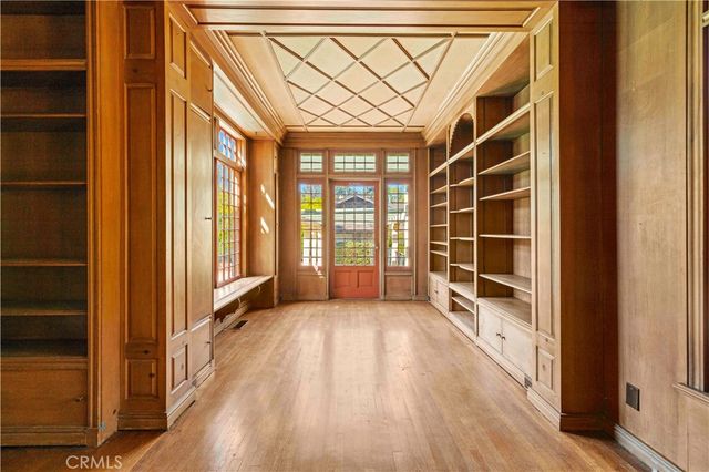 a view of entryway with wooden floor