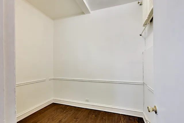 a view of small space with racks on the wall