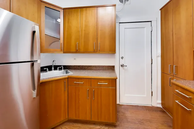 a kitchen with a stove and a microwave