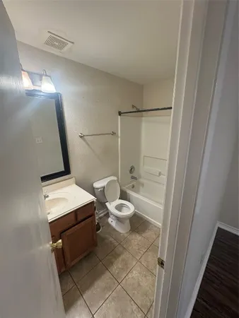 a bathroom with a sink and a shower