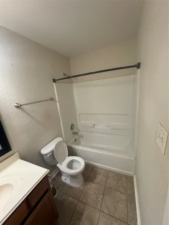 a bathroom with a sink a mirror and a toilet