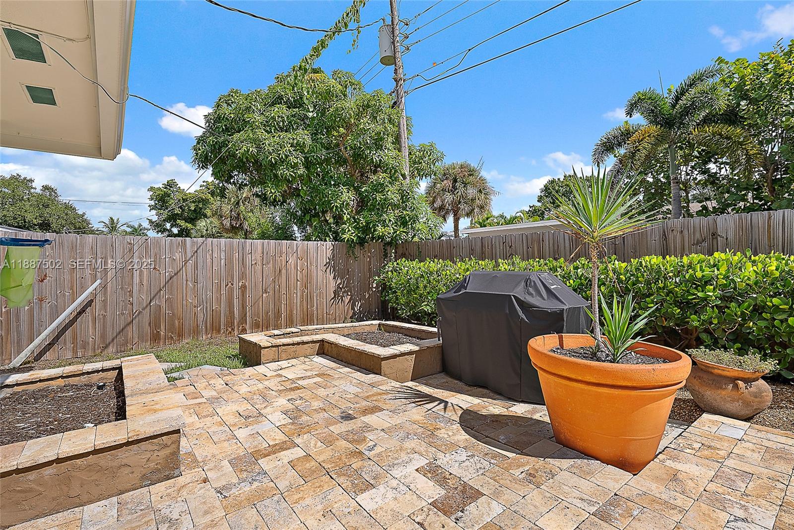 367 West Riverside Drive Tequesta, FL 33469 - Photo 16 of 23 a view of outdoor space yard and patio
