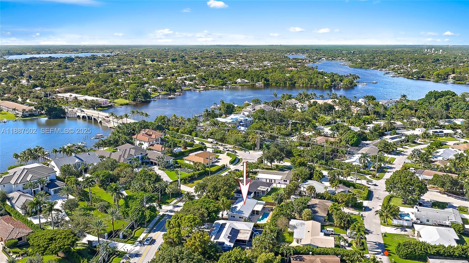 367 West Riverside Drive Tequesta, FL 33469 - Photo 23 of 23 an aerial view of residential houses with outdoor space and trees