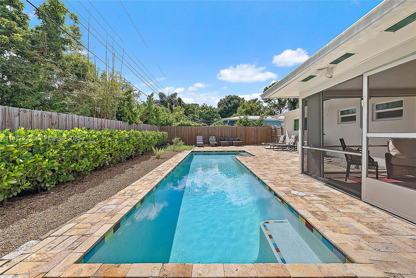 367 West Riverside Drive Tequesta, FL 33469 - Photo 5 of 23 a view of swimming pool with a lounge chair