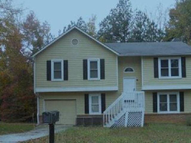 3778 Conley Downs Lane Decatur, GA 30034 - Photo 1 of 1 a front view of a house with garden
