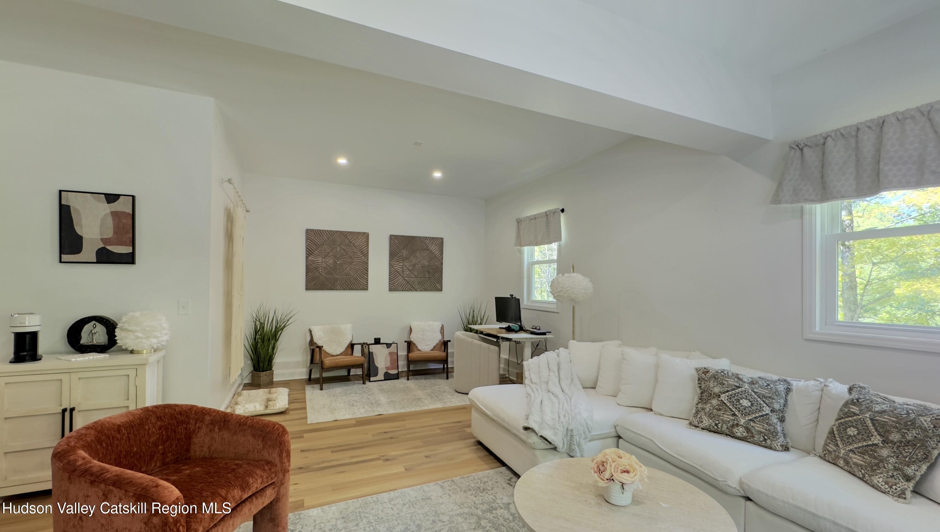 1801 Sleepy Hollow Road Athens, NY 12015 - Photo 11 of 34 a living room with furniture and a couch