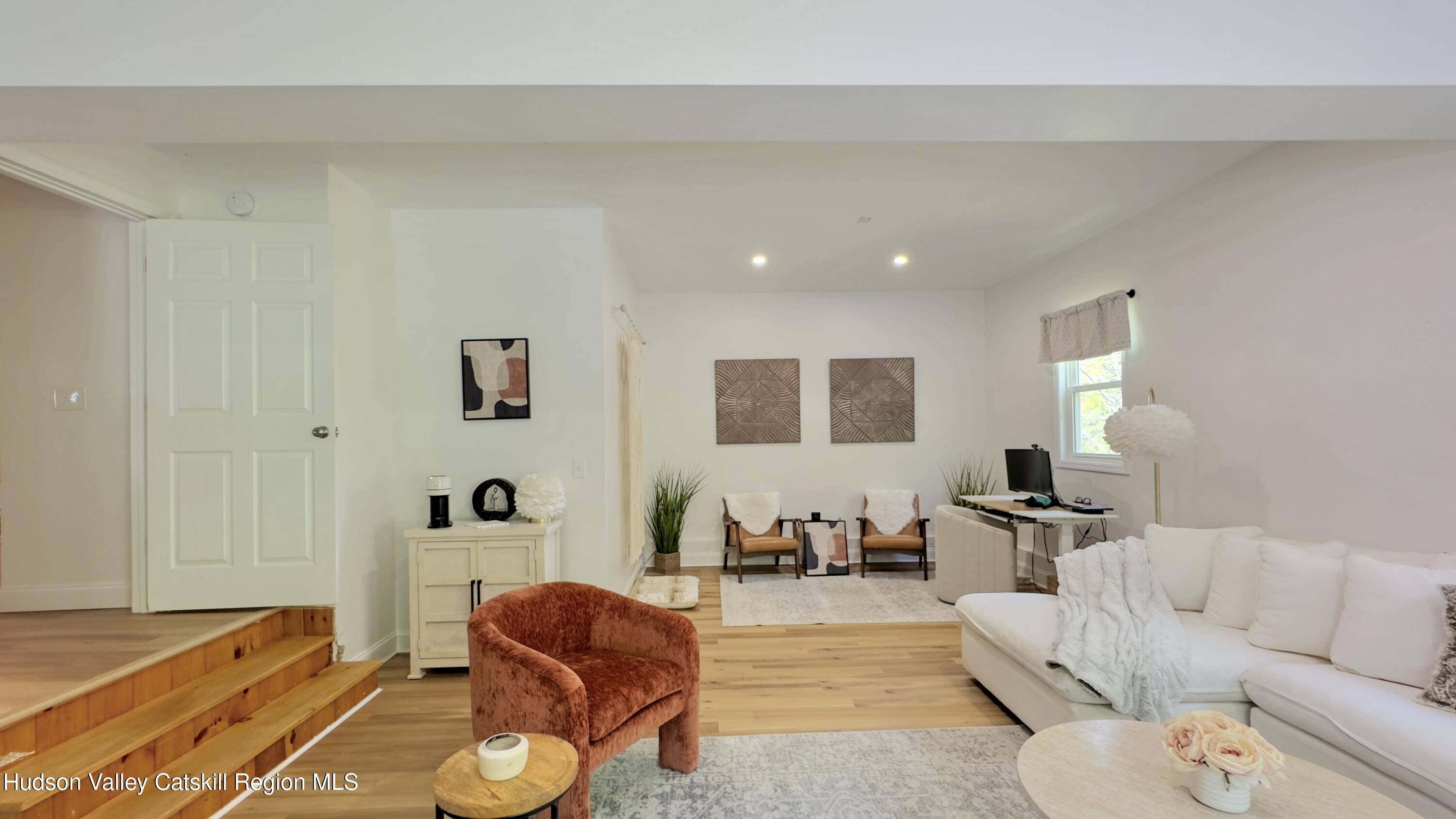 1801 Sleepy Hollow Road Athens, NY 12015 - Photo 13 of 34 a living room with furniture and a window