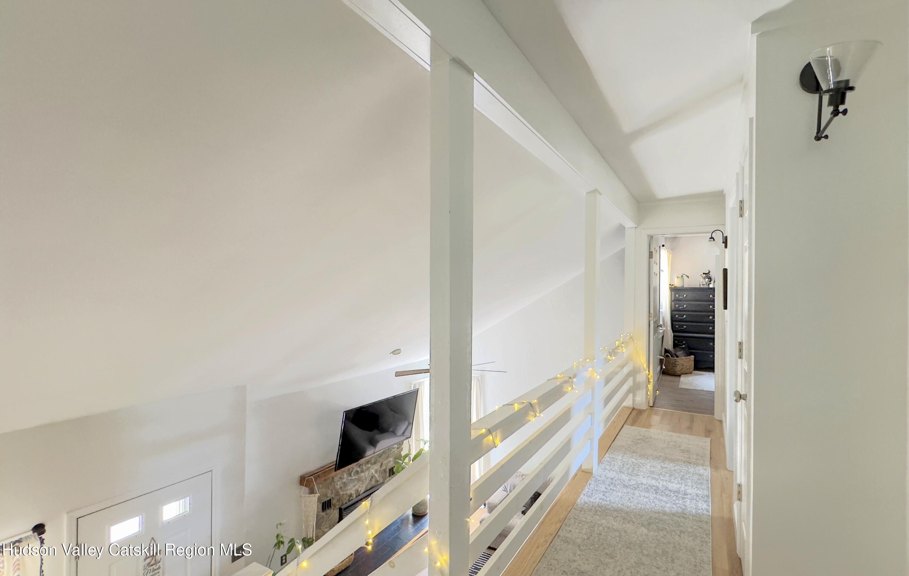 1801 Sleepy Hollow Road Athens, NY 12015 - Photo 16 of 34 a view of a hallway with staircase