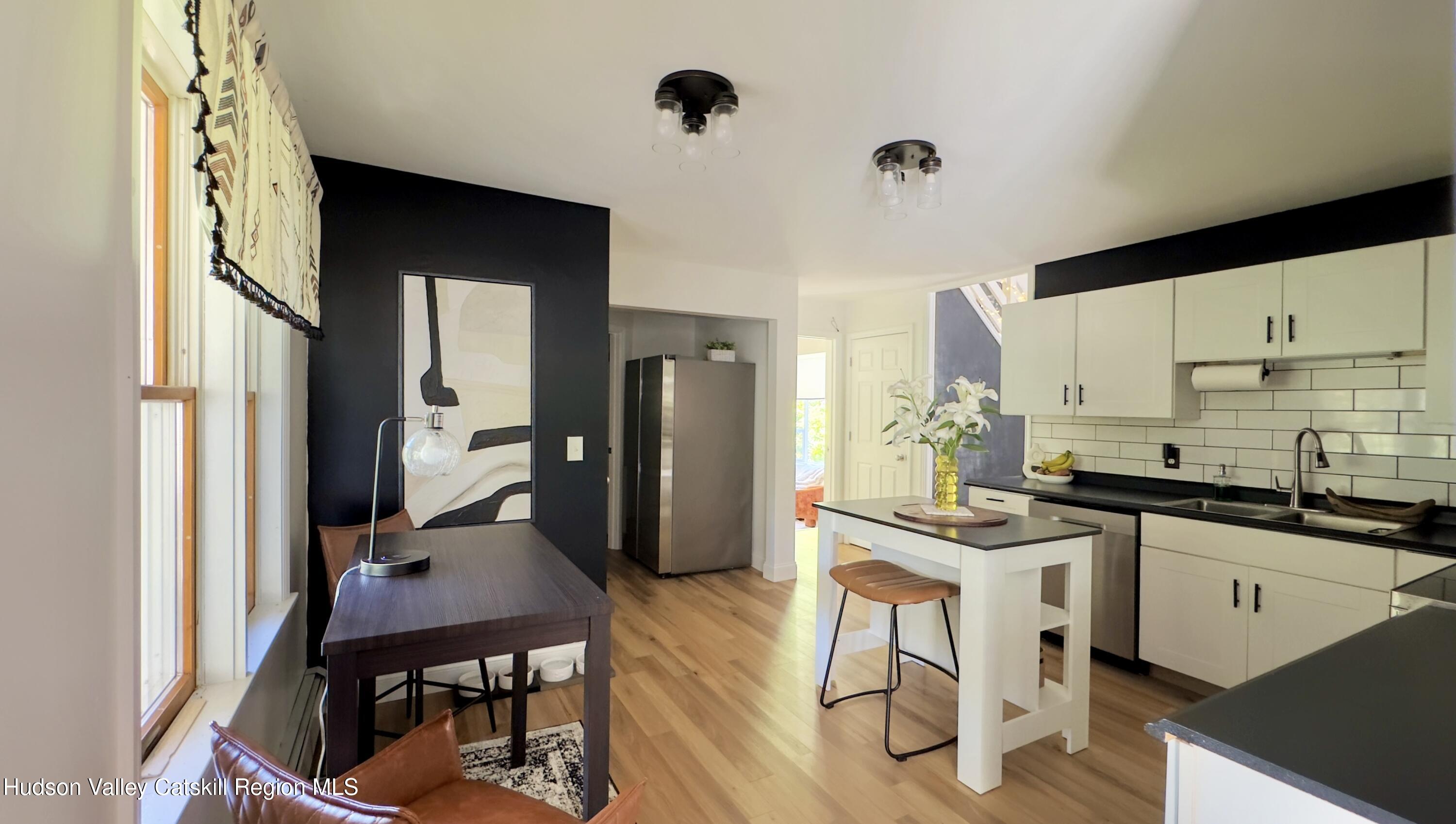 1801 Sleepy Hollow Road Athens, NY 12015 - Photo 5 of 34 a kitchen with granite countertop a sink cabinets and stainless steel appliances