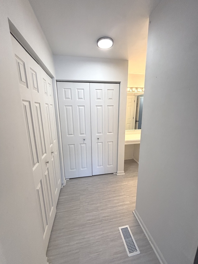268 Windsor Court, Unit D South Elgin, IL 60177 - Photo 15 of 21 a view of entryway with wooden floor
