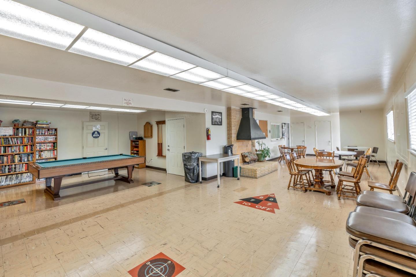 356 Reservation Road, Unit 68 Marina, CA 93933 - Photo 32 of 32 a living room with furniture and a wooden floor
