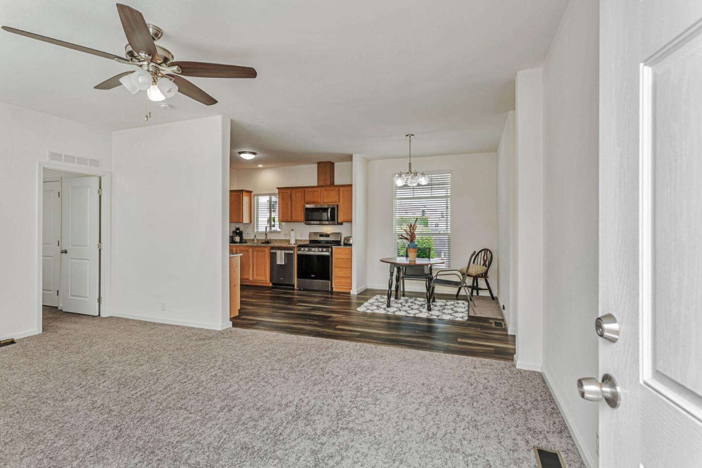 356 Reservation Road, Unit 68 Marina, CA 93933 - Photo 5 of 32 a living room with furniture and kitchen view
