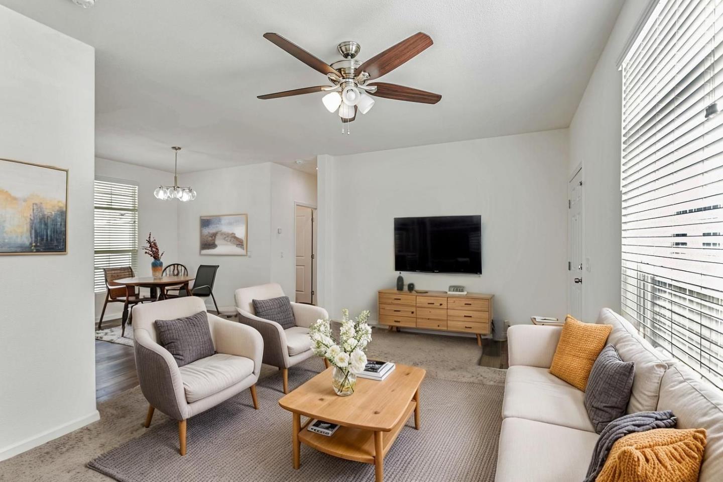 356 Reservation Road, Unit 68 Marina, CA 93933 - Photo 6 of 32 a living room with furniture and a flat screen tv