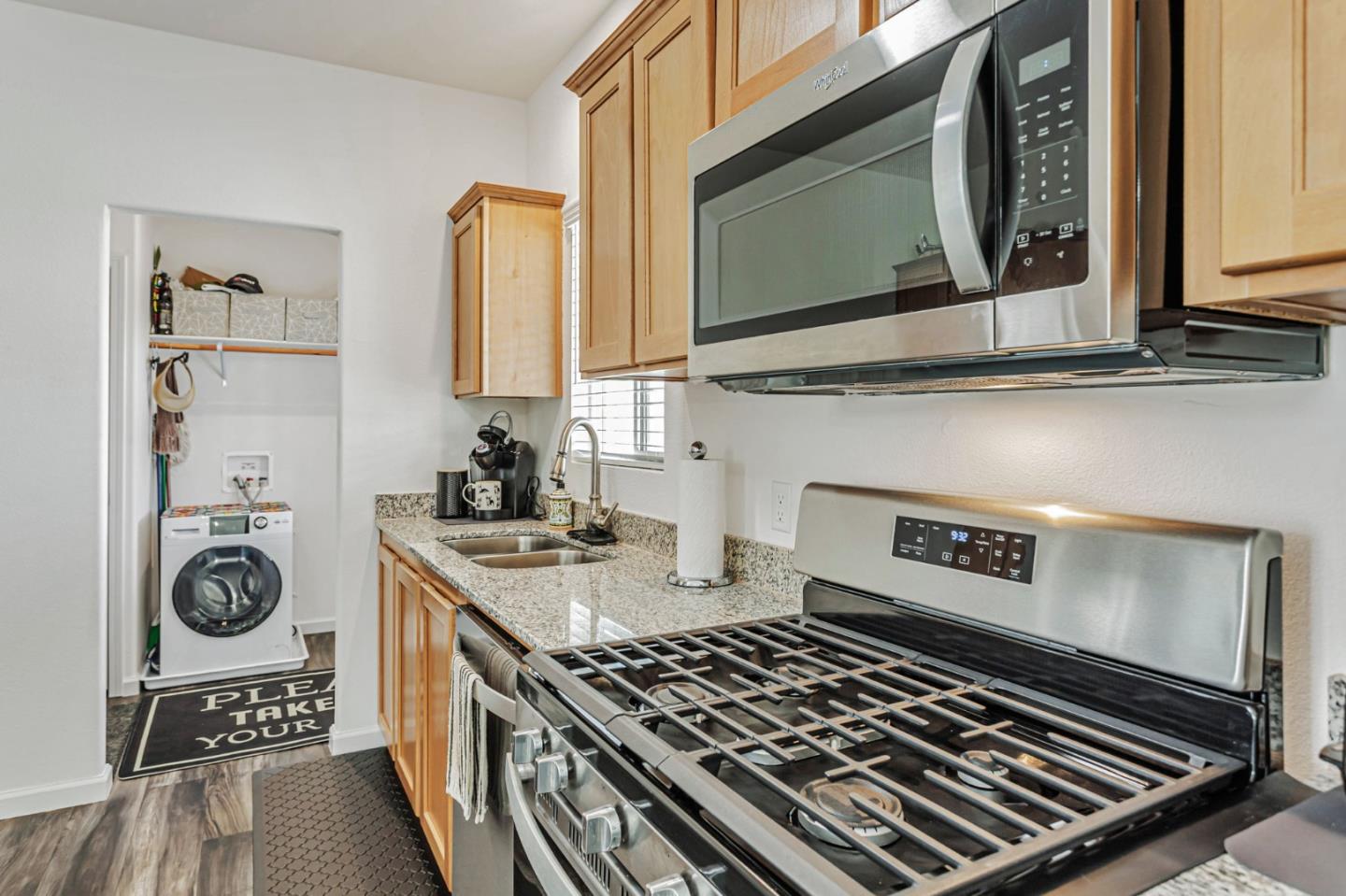356 Reservation Road, Unit 68 Marina, CA 93933 - Photo 10 of 32 a kitchen with a stove and a microwave