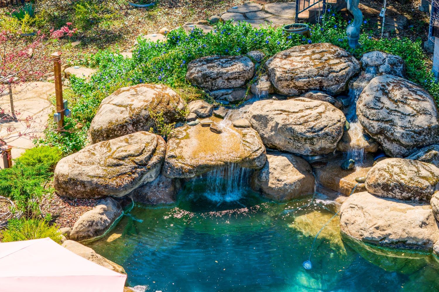 5161 Coyote Pass Road Shingle Springs, CA 95682 - Photo 2 of 48 Natural style pool has a calming waterfall!