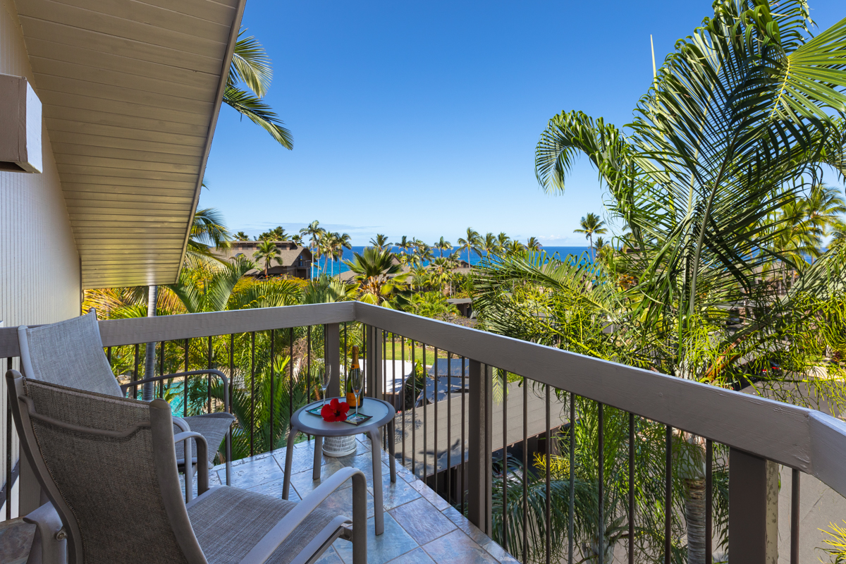 Indulge yourself while soaking up the feel of a tropical paradise from the primary bedroom lanai.