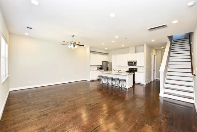 a view of kitchen with table and chairs