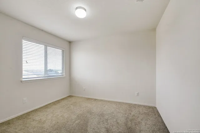 an empty room with a window