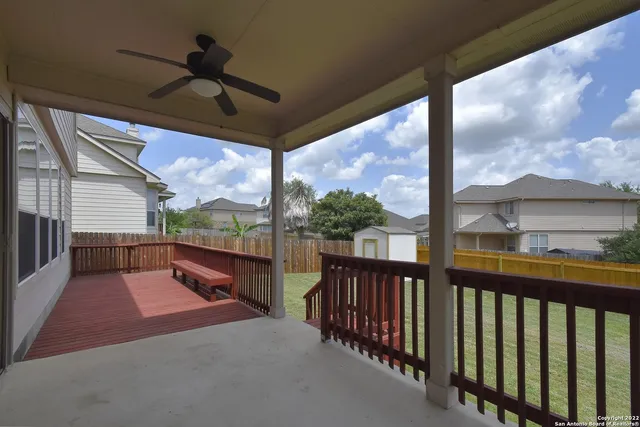 a view of a porch with a furniture