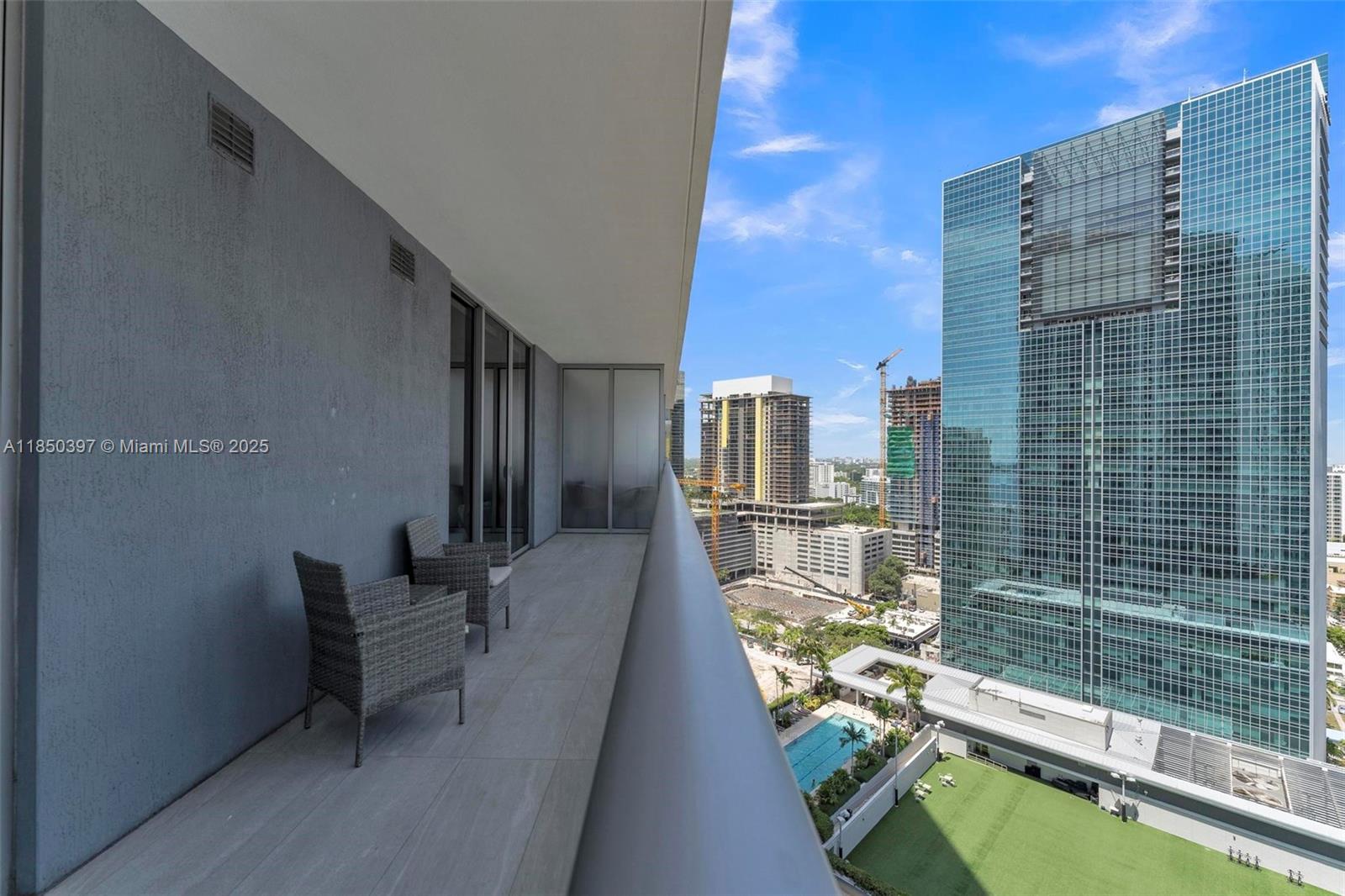 1300 Brickell Bay Drive, Unit 2511 Miami, FL 33131 - Photo 22 of 30 a view of balcony with couch