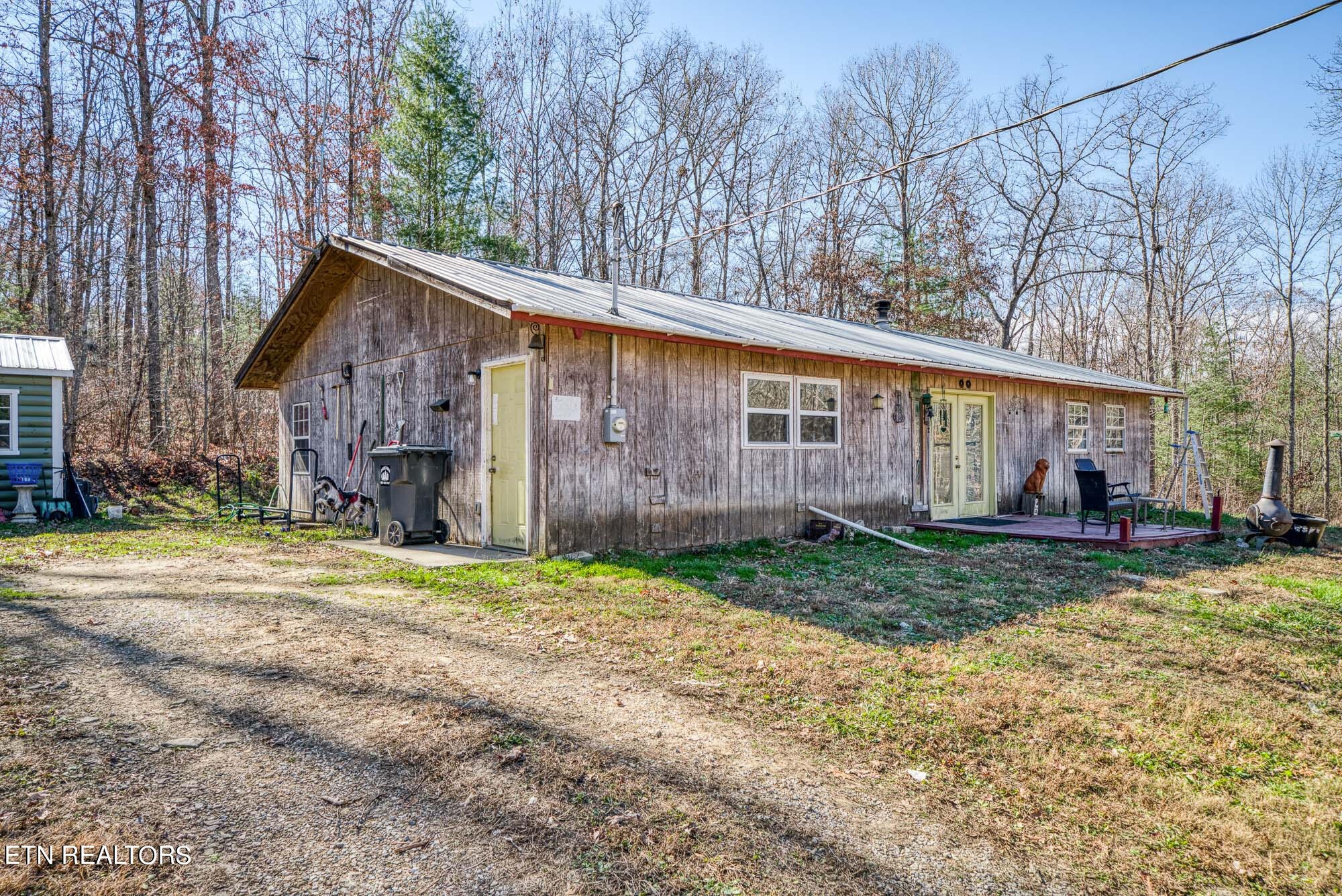 a view of a barn in the middle of house