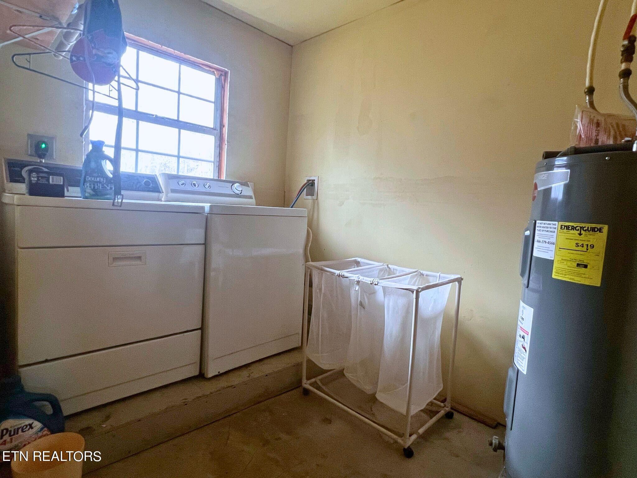 109 Nelson Road Lancing, TN 37770 - Photo 22 of 30 a room with storage and utility