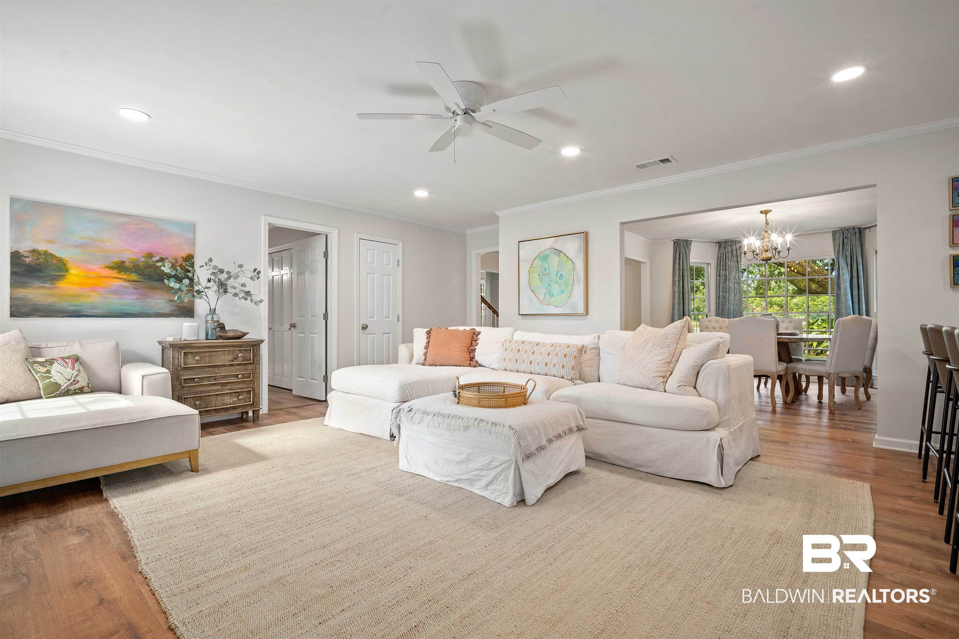 700 Eliza Jordan Road North Mobile, AL 36608 - Photo 3 of 44 Living area with wood finished floors, a chandelier, recessed lighting, ornamental molding, and a ceiling fan