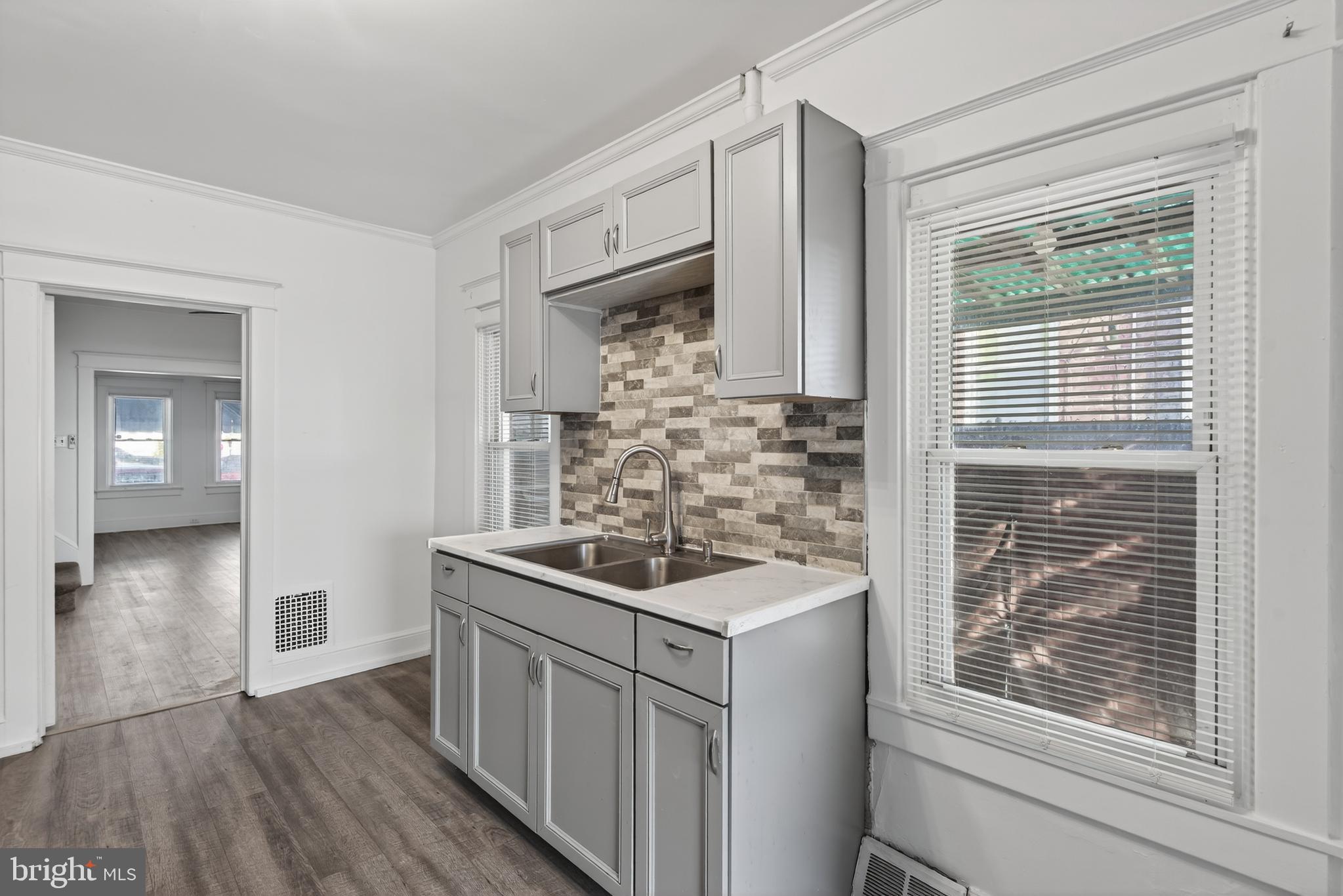 724 York Street York, PA 17403 - Photo 15 of 28 a kitchen with a stove and a window