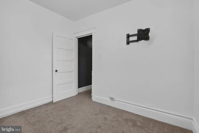 an empty room with closet