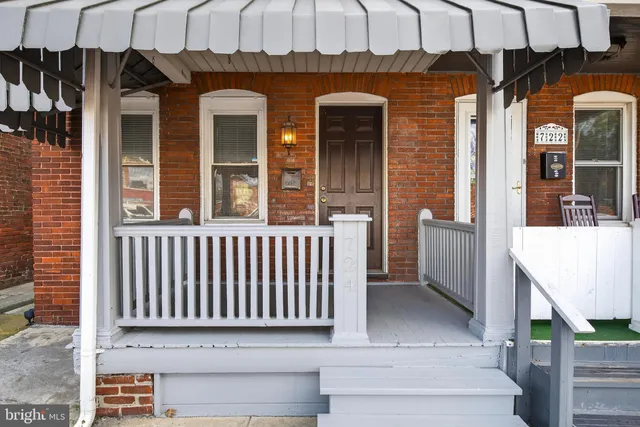 a view of a brick house with a window