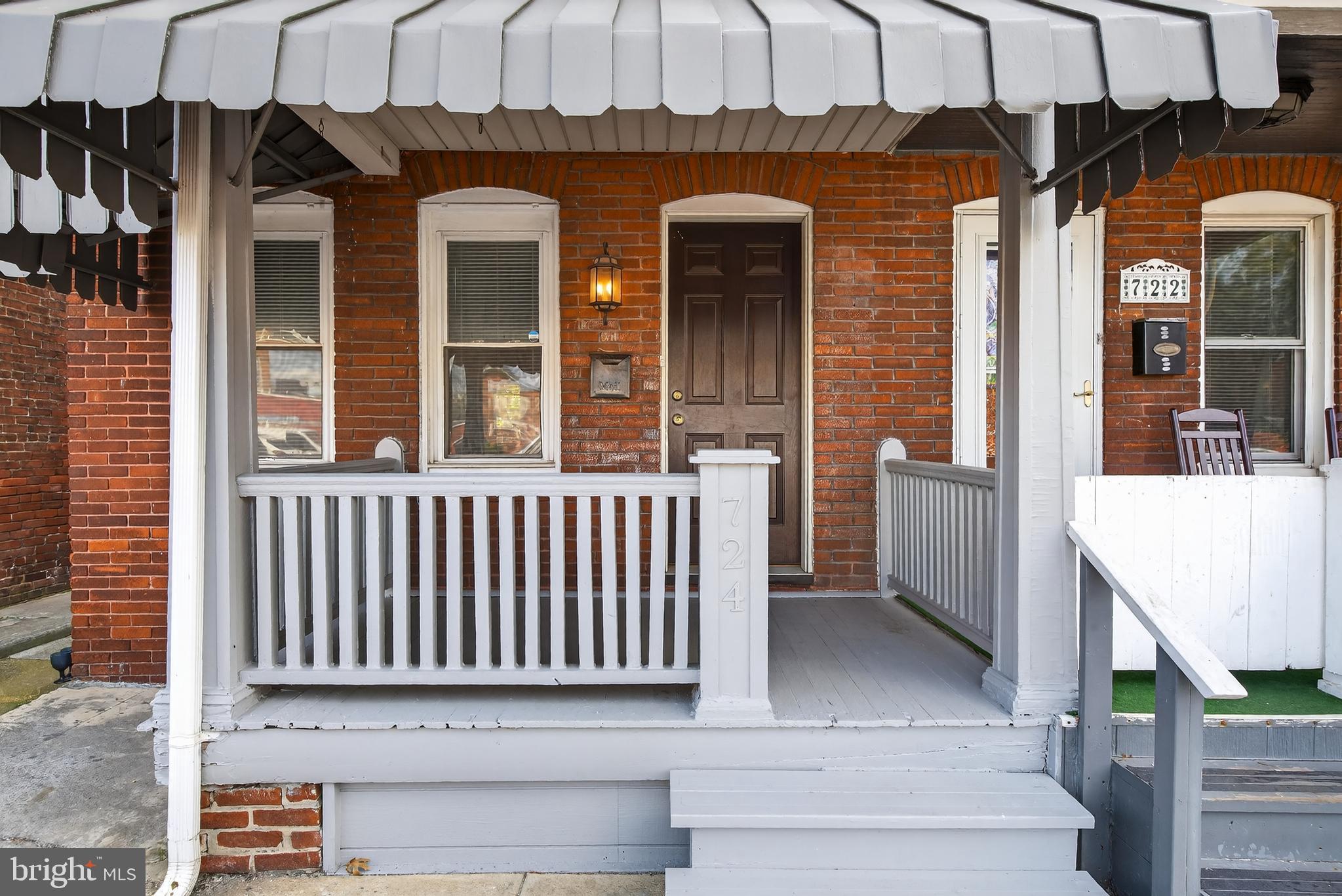 724 York Street York, PA 17403 - Photo 3 of 28 a view of a brick house with a window