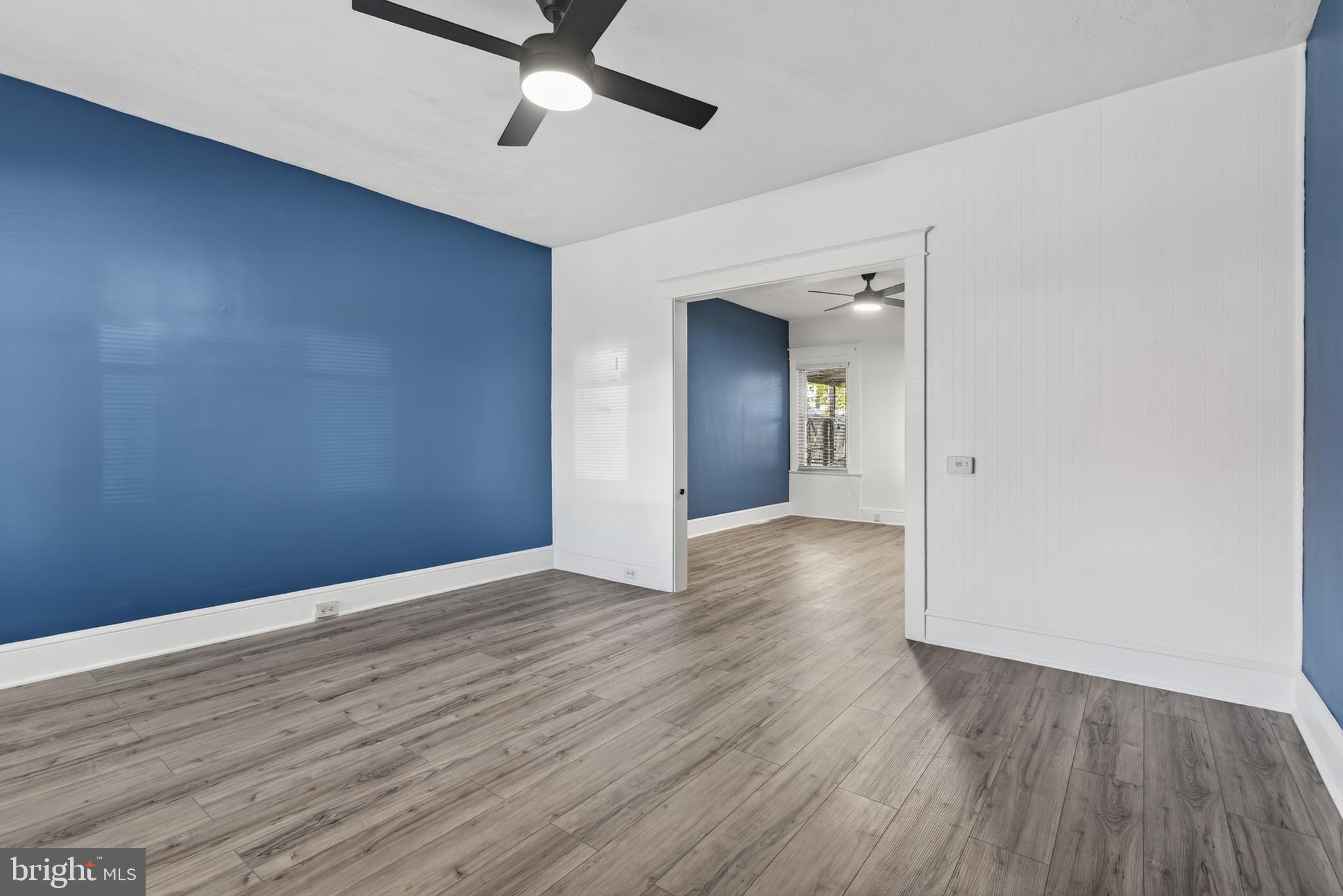 724 York Street York, PA 17403 - Photo 5 of 28 a view of an empty room with wooden floor