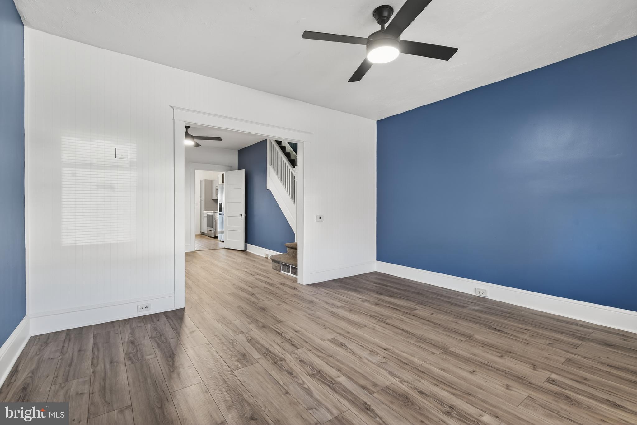 724 York Street York, PA 17403 - Photo 7 of 28 wooden floor in an empty room with a window