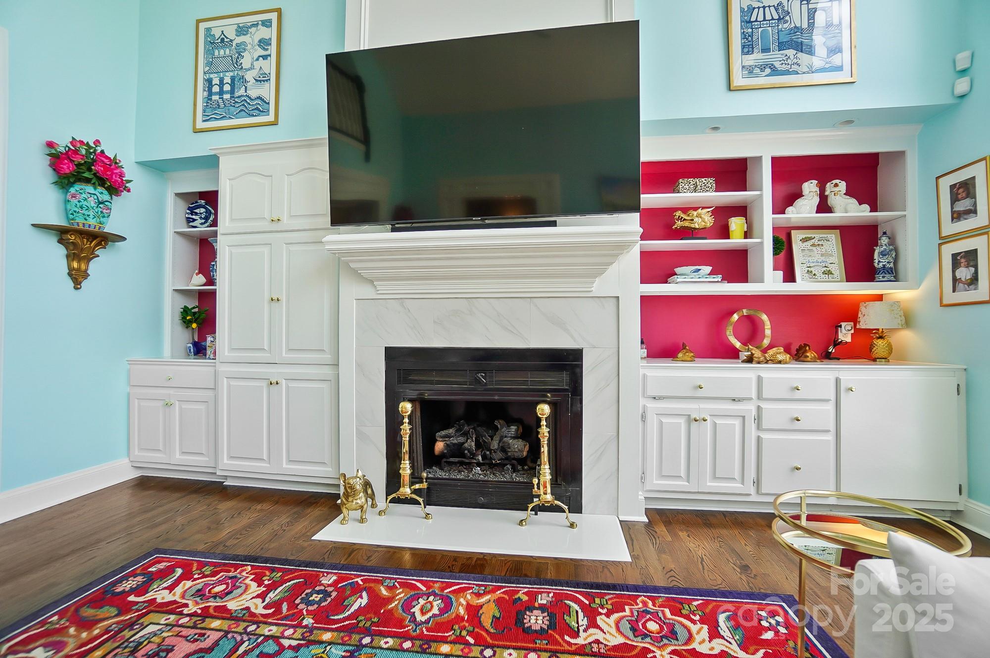 469 Valley Run Road Waxhaw, NC 28173 - Photo 13 of 48 a living room with furniture and a flat screen tv