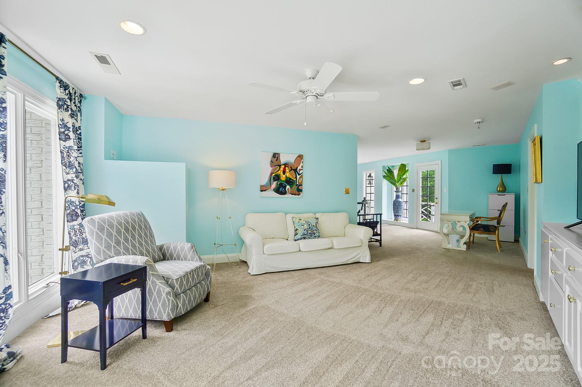 469 Valley Run Road Waxhaw, NC 28173 - Photo 30 of 48 a living room with furniture and a chandelier