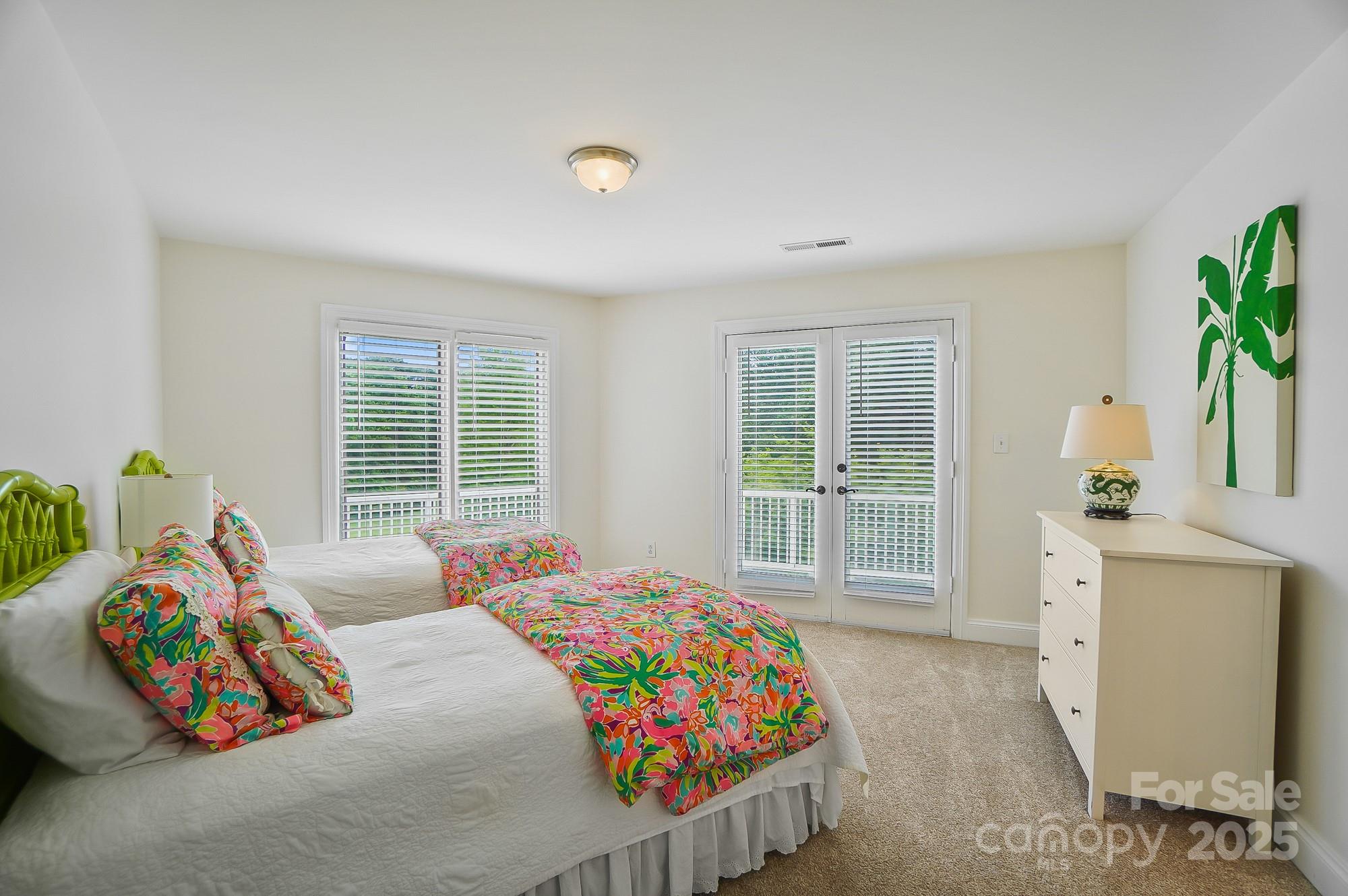 469 Valley Run Road Waxhaw, NC 28173 - Photo 33 of 48 a bedroom with furniture and a baby crib