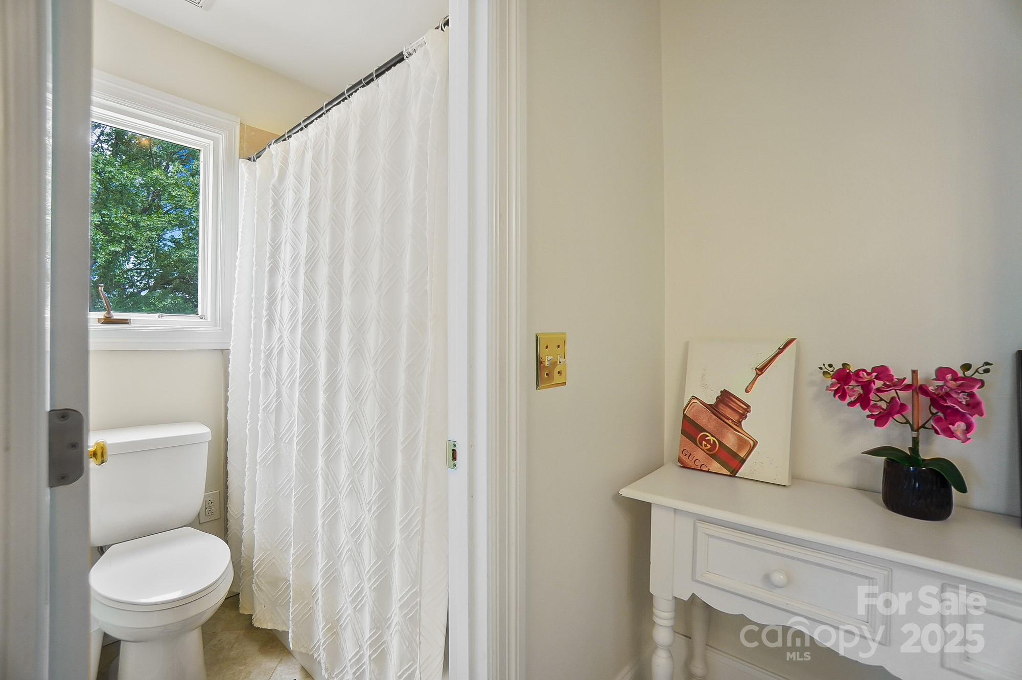 469 Valley Run Road Waxhaw, NC 28173 - Photo 35 of 48 a bathroom with a toilet and a sink