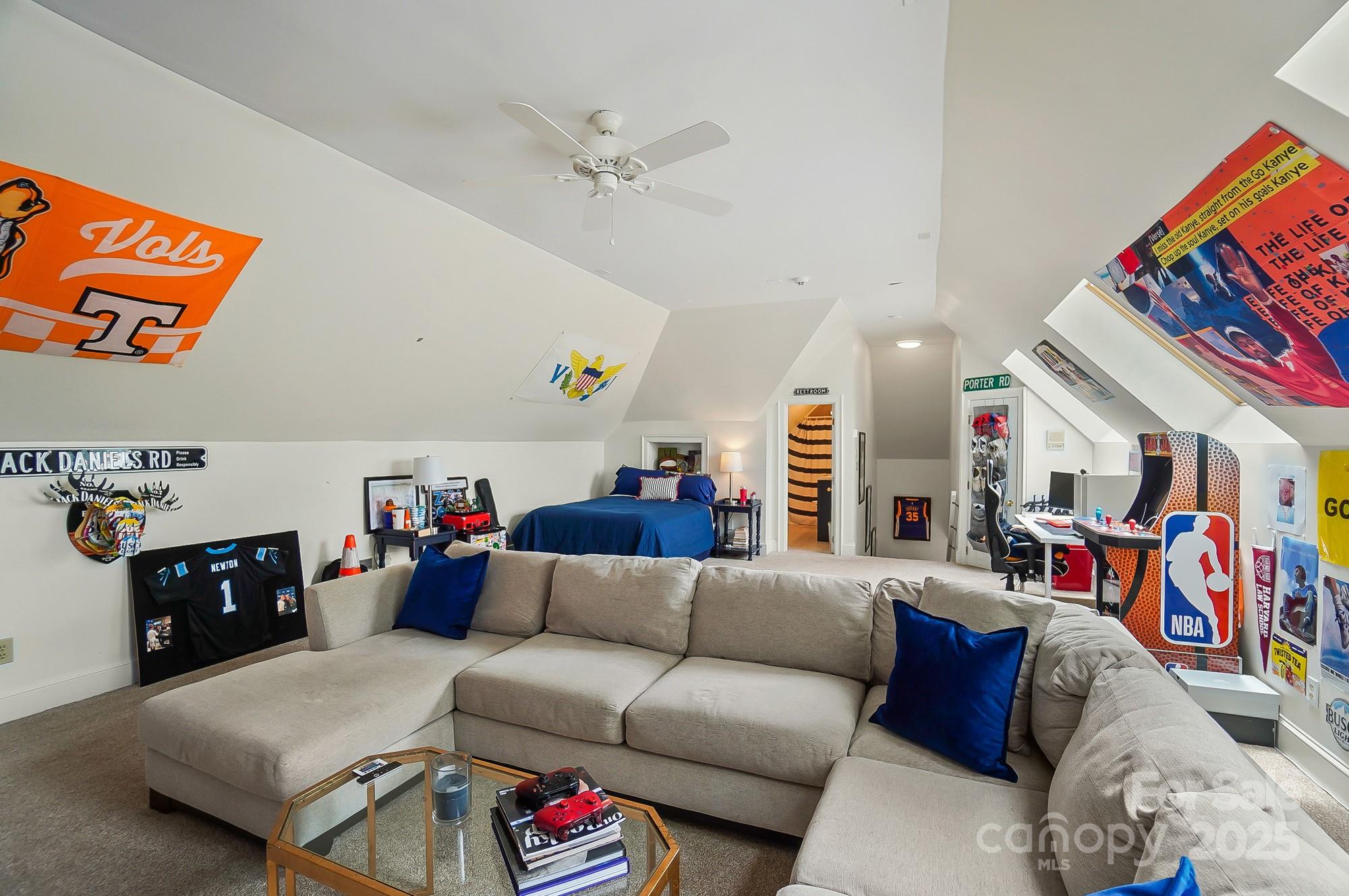 469 Valley Run Road Waxhaw, NC 28173 - Photo 42 of 48 a living room with furniture and a gym equipment