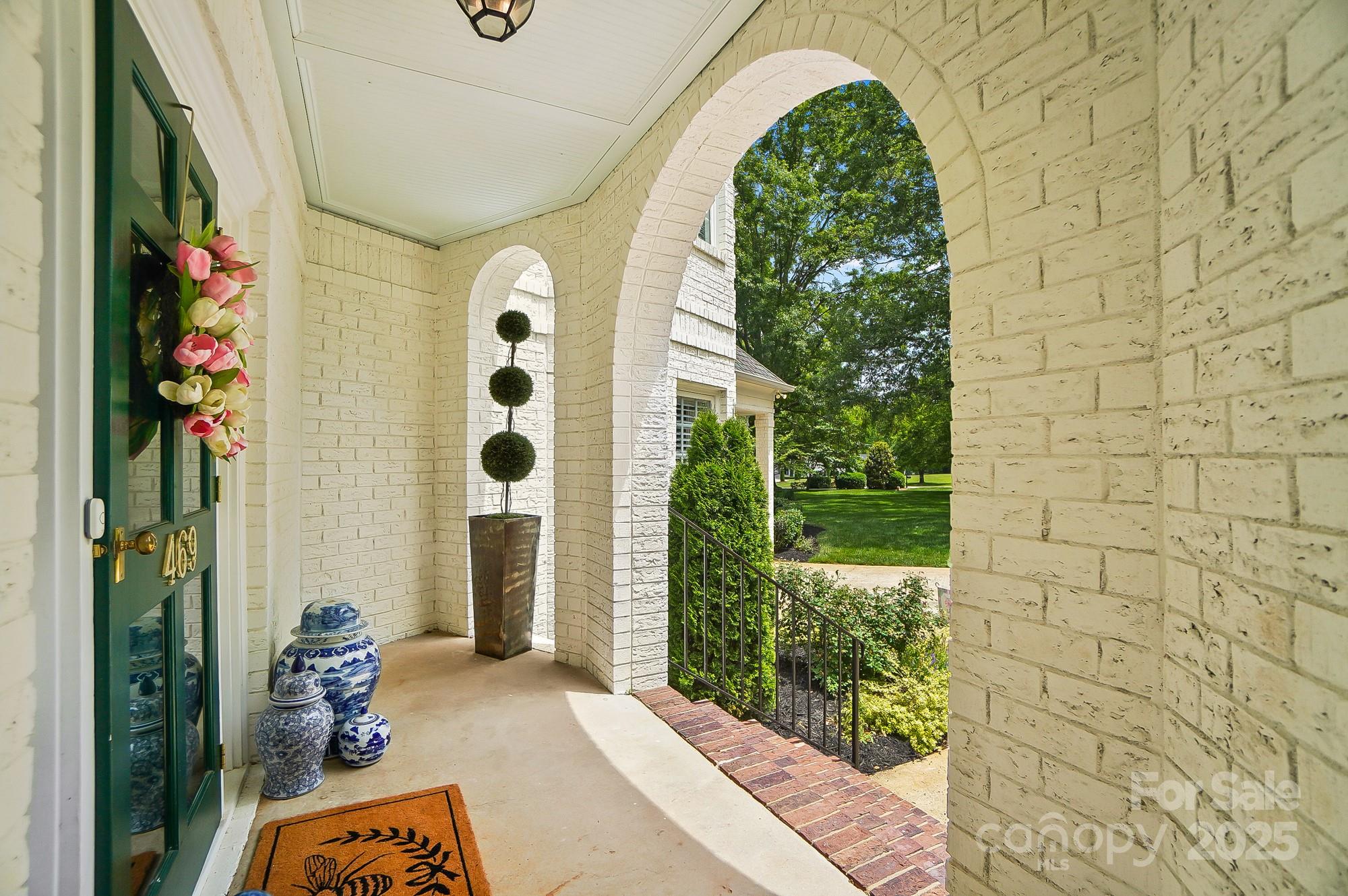 469 Valley Run Road Waxhaw, NC 28173 - Photo 5 of 48 a front view of a house with garden