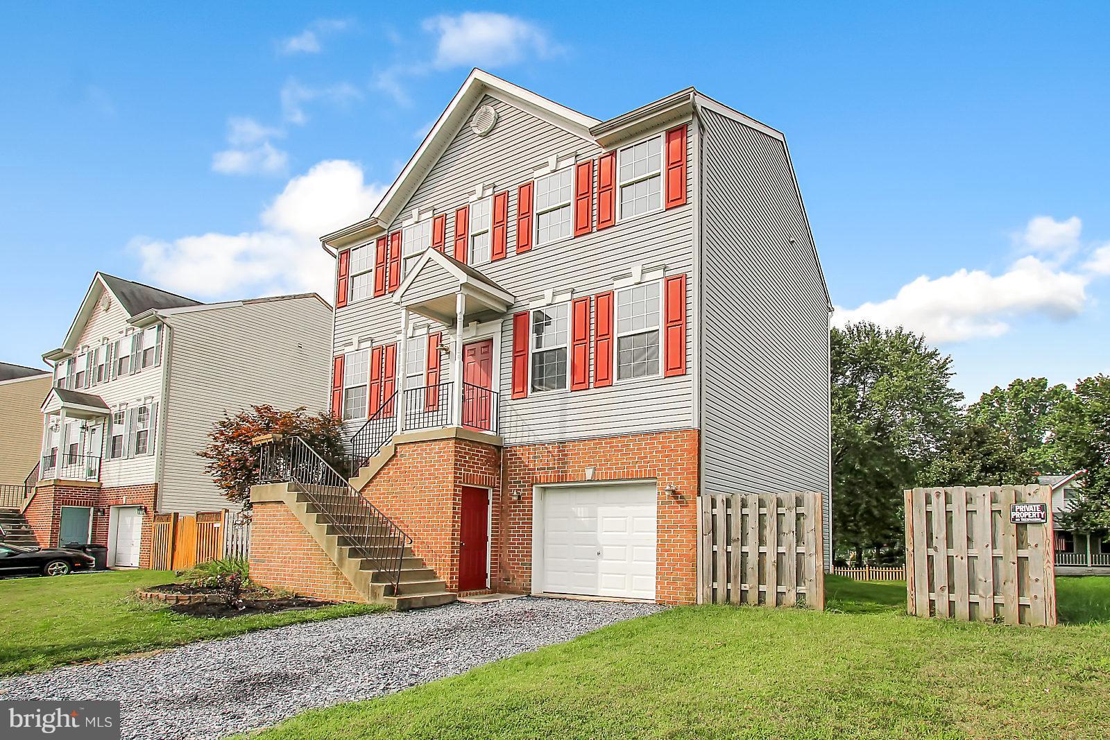 532 Grovethorn Road Baltimore, MD 21220 - Photo 1 of 30 a front view of a house with a yard