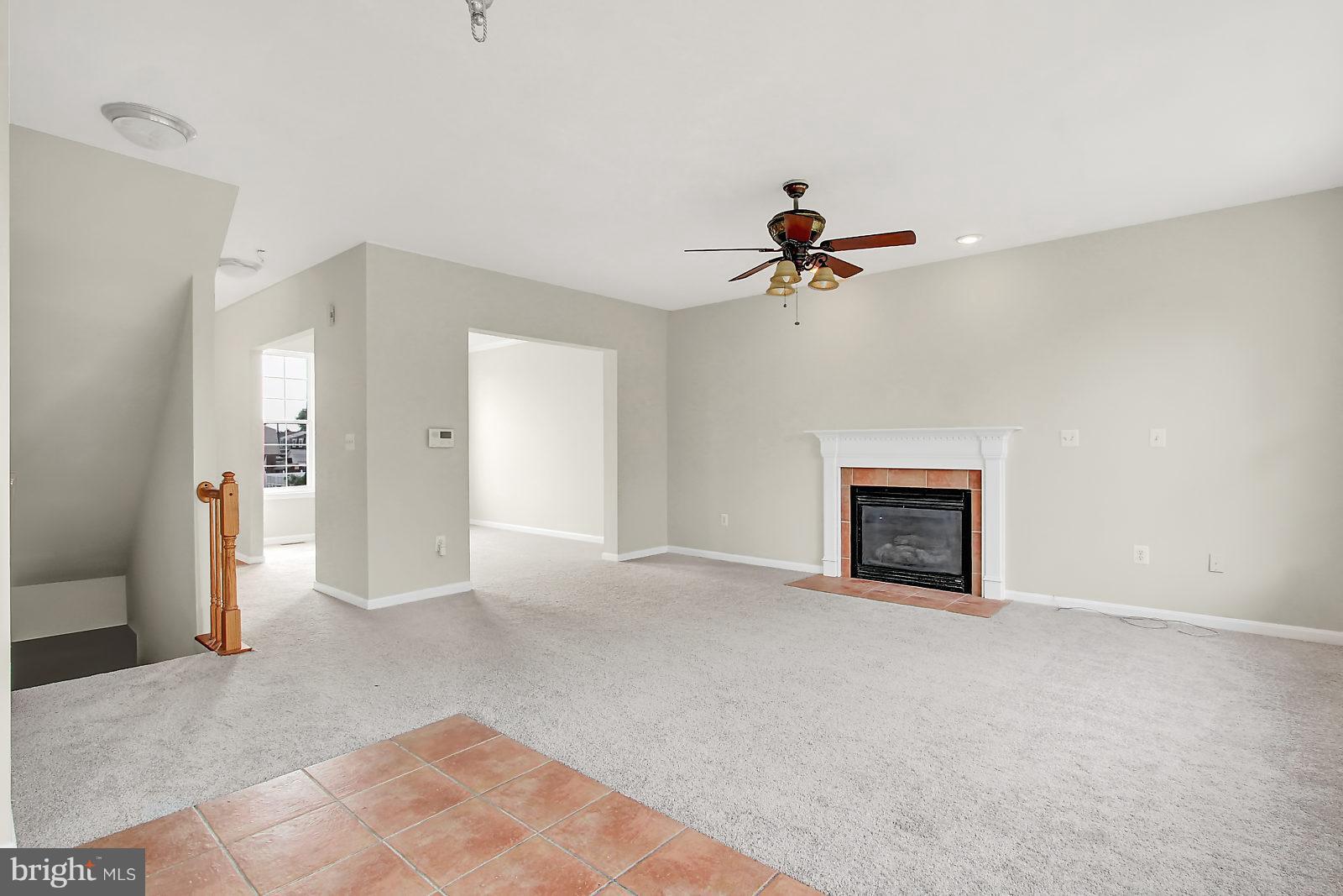 532 Grovethorn Road Baltimore, MD 21220 - Photo 16 of 30 a view of an empty room with a ceiling fan