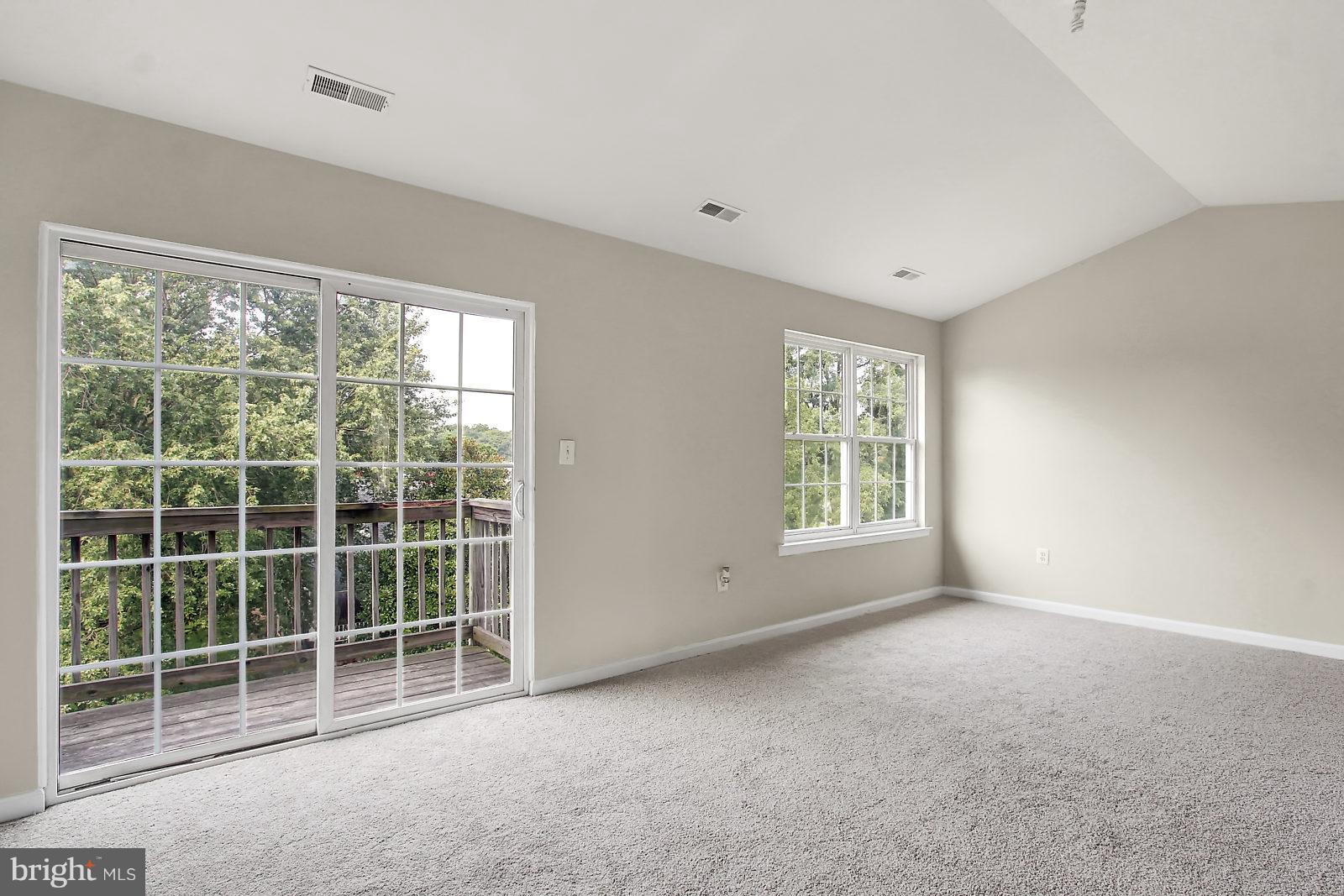 532 Grovethorn Road Baltimore, MD 21220 - Photo 19 of 30 a view of empty room with windows