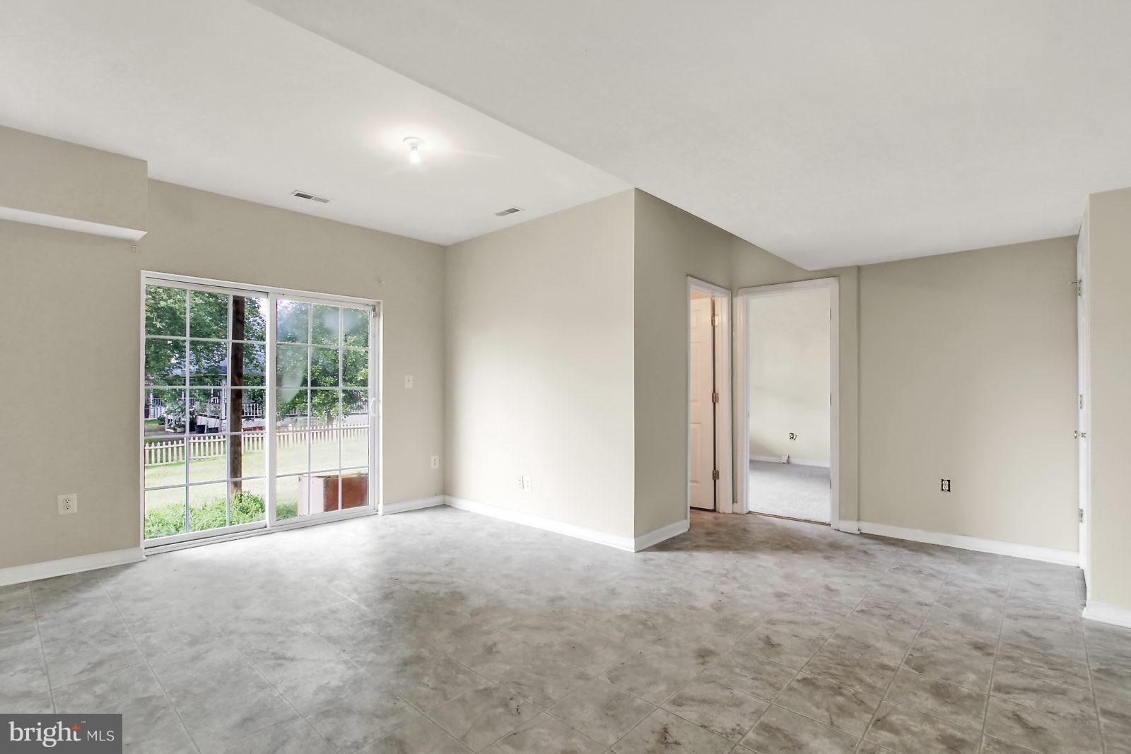 532 Grovethorn Road Baltimore, MD 21220 - Photo 23 of 30 a view of empty room with floor to ceiling window