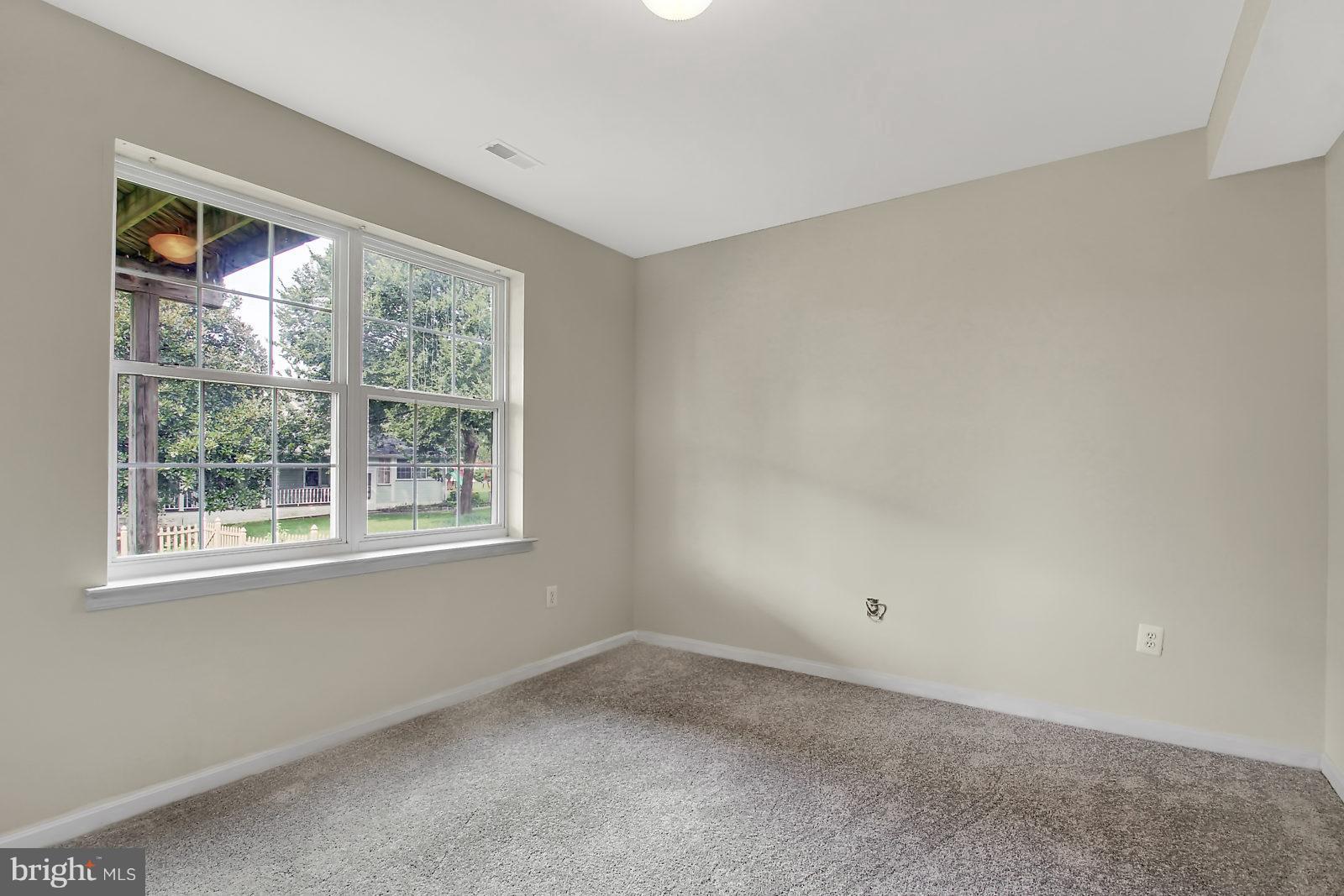 532 Grovethorn Road Baltimore, MD 21220 - Photo 24 of 30 an empty room with a window